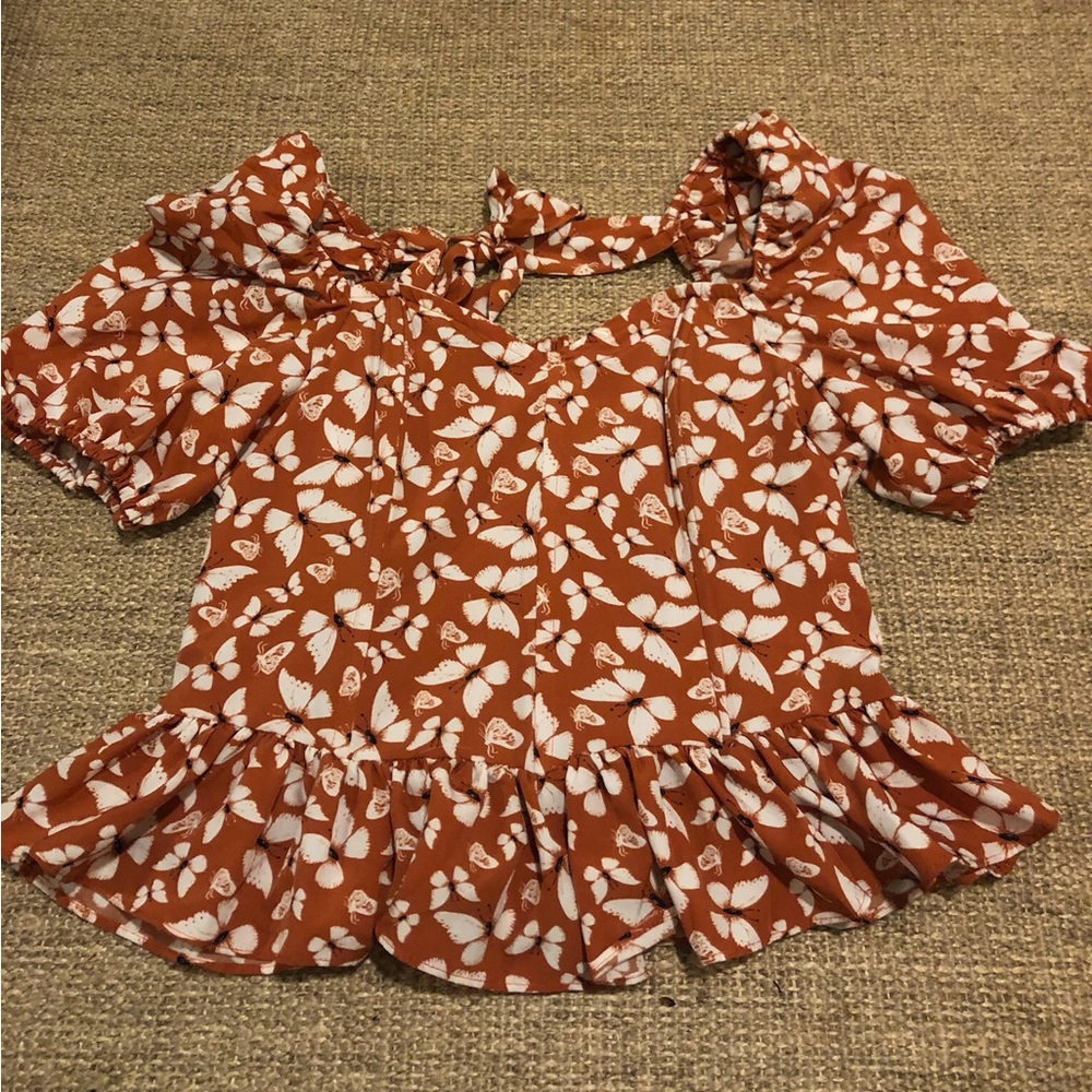 orange and white butterfly top